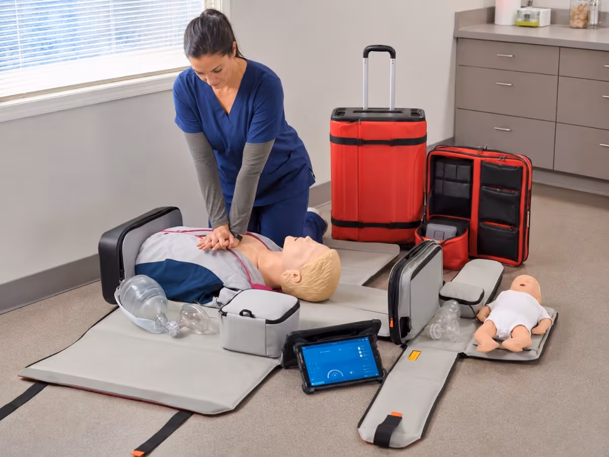 CPR Go-Kit with adult and infant manikins packed in travel cases